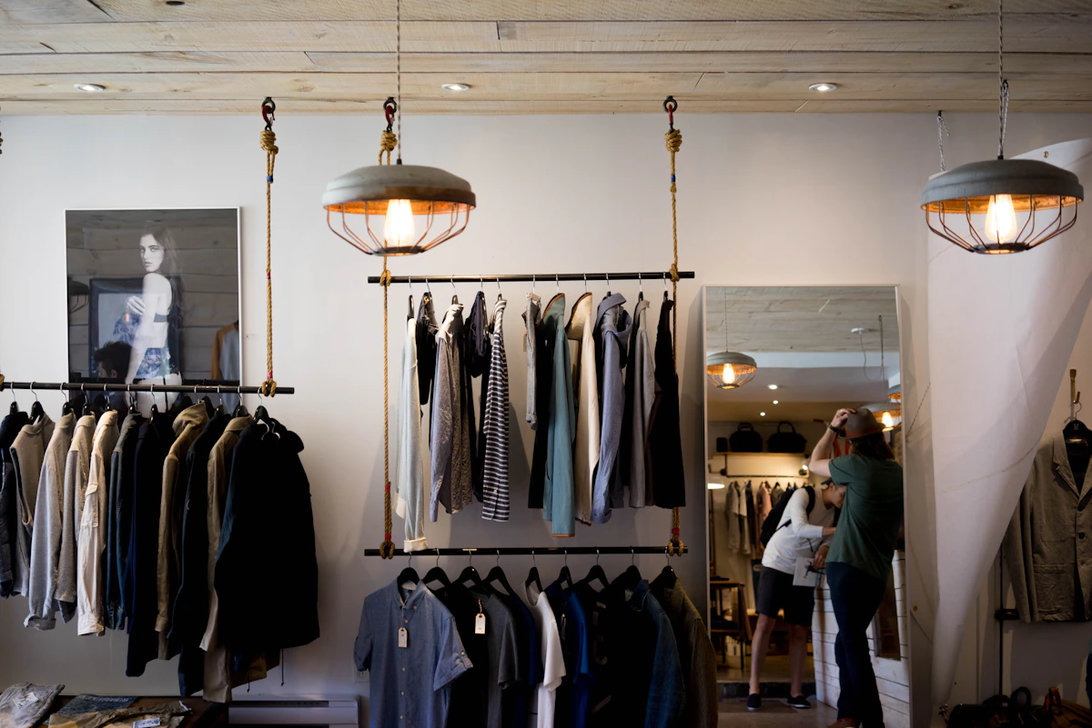 Clothing rails illustrating how to compare cheap online clothing stores UK shoppers use