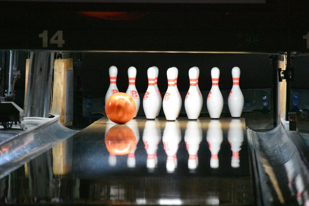Bowling ball and pins representing UK entertainment birthday freebies and discounts