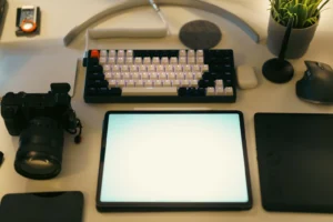 Drawing tablet and creative tools on a designer’s desk