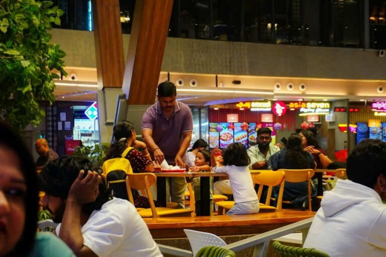 Family dining out representing UK kids eat free and kids eat for £1 deals