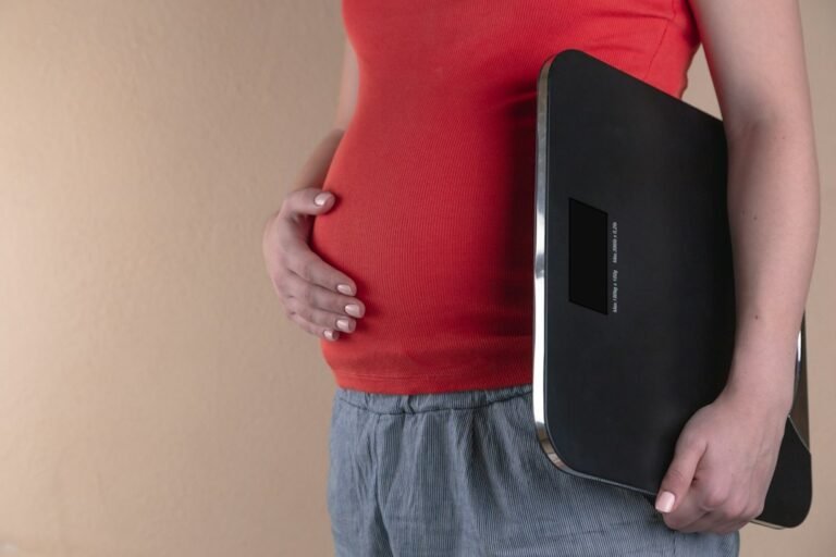 Pregnant woman representing UK pregnancy benefits and grants